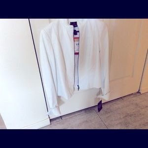 New, still with tag beautiful white Danier jacket
